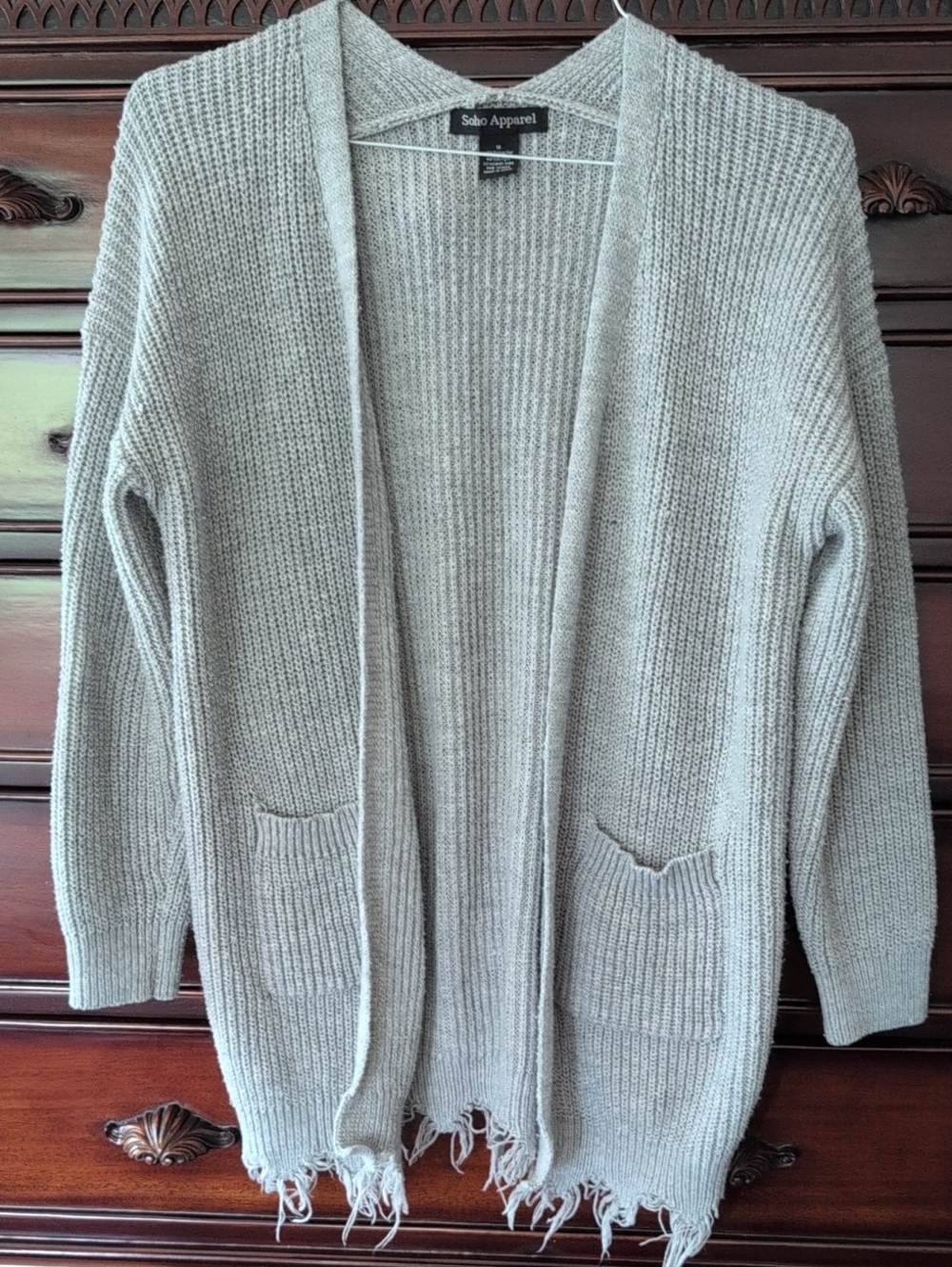 Women's Open Front Gray Knit Cardigan With A Fringed Bottom.  Long Sleeves